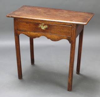 An 18th/19th Century oak side table/low boy fitted 1 long drawer, raised on square tapered supports 70cm h x 75cm w x 40cm d 