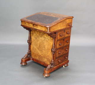 A Victorian inlaid figured walnut Davenport with hinged lid the pedestal fitted 4 drawers with tore handles, raised on bun feet, 77cm h x 54cm w x 21cm d 
