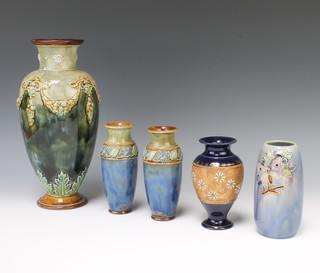 A Royal Doulton oviform vase decorated with swags of flowers 30cm, a pair of do. tapered vases 16cm and 2 other Doulton vases 16cm 