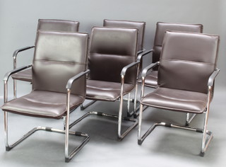 A set of 6 mid 20th Century Paal chrome and leather cantilever dining chairs 

