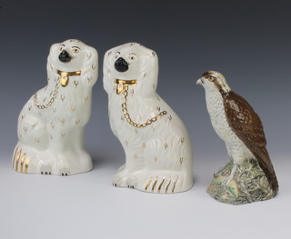A Beswick Osprey Beneagles liquor bottle 20cm and a pair of Beswick spaniels 24cm 