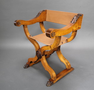 An Italian style carved walnut folding throne chair 