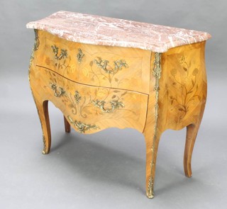 An Inlaid Kingwood commode of serpentine outline with pink veined marble top and gilt metal mounts, fitted 2 long drawers, raised on cabriole supports 82cm h x 100cm w x 46cm d 
