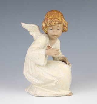 A Lladro matt figure of an angel with snail 2214 15cm 