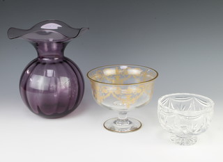 A crystal glass pedestal bowl 10cm, a purple glass vase 20cm and a pedestal bowl 15cm 
