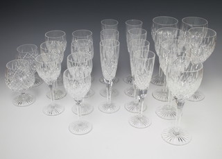 A suite of Stuart Crystal Shaftesbury cut glass tableware comprising 2 brandy balloons, 7 champagne flutes, 7 small wine glasses, 6 large wines, 6 liqueurs and 7 sherry glasses