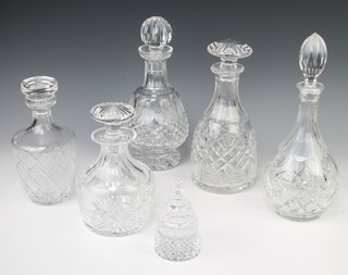 A cut glass spirit decanter and stopper 25cm, 4 others and a paperweight 
