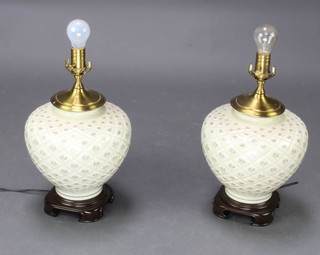 A pair of crackle glazed baluster vase table lamps with hardwood mounts 30cm 