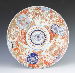 An early 20th Century Chinese Imari charger decorated with exotic birds and flowers 48cm 