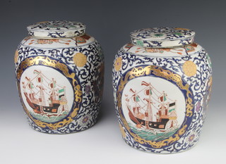 A pair of Chinese antique style Imari baluster vases and covers decorated with galleons 26cm 