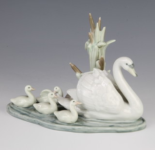 A Lladro group of a swan and cygnets 5722 15cm