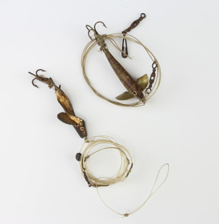 An early Horn minnow circa 1880, together with a Green's spiral minnow 
