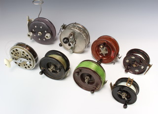 An Alcocks steel centre pin sea fishing reel 6", 3 Alcocks aerial bakelite sea fishing reels, a Halo do. and 3 other reels 