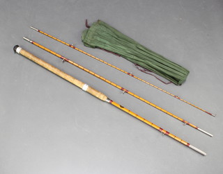 A Black Seal split cane Avon 3 section fishing rod 10'6" in a cloth bag