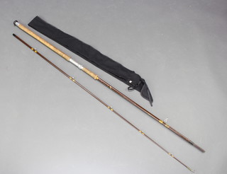 A Hardy 9'6" fibre glass spinning fishing rod "The Fibrillate Spinning" 