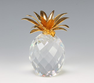 A Swarovski Crystal pineapple with gilt leaves designed by Max Schreck 010044/7507105001 boxed 1981 8 1/2cm 