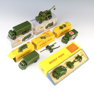 A Dinky Super Toy no.661 Recovery Truck boxed, do. 662 10 Ton Army Truck boxed, a Dinky Meccano 621 3 Ton Army Truck boxed (flaps to box damaged), do. 626 Military Ambulance boxed, do. 692 5.5 Medium Gun boxed (flaps to box damaged) and do. 697 25 Pound Field Gun Set  
