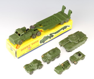 A Dinky 660 Tank Transporter boxed (box written on) and 5 other Dinky military vehicles - 651 Centurion Tank, 670 Armoured Car, 673 Scout Car (wheels damaged), 674 Austin Champ and 676 Armoured Personnel Carrier 