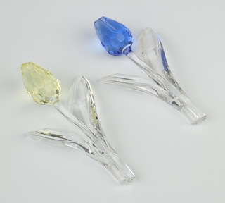 A Swarovski Crystal Tulip Blue 606546 2002, 9cm, a do. Yellow Tulip by Keiko Arai 657110/9460200004 2004, 9cm boxed 