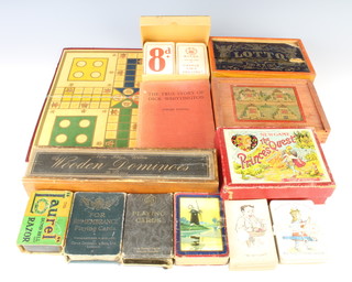 A set of wooden Non Plus Ultra 55 dominoes cased, a wooden building block set cased, a Lotto set cased, a New Game The Princes Quest, a set of Chas Goodall & Sons remembrance playing cards, complete, used and worn in places, a Laurel Dumbbell razor and 1 vol. "The True Story of Dick Whittington" etc 
