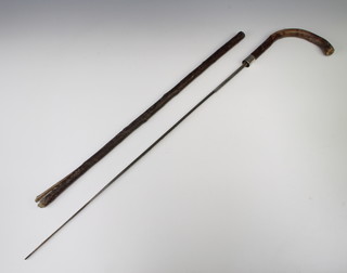 A Victorian sword stick with 63cm Toledo steel blade
