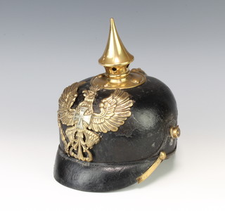 A German First World War Pickelhaube complete with helmet plate (chin strap missing) 
