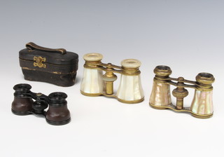 Two pairs of gilt metal and mother of pearl opera glasses together with a pair of French opera glasses marked Lemaire Fabt Paris together with 2 19th Century bleeding knives contained in a leather case 