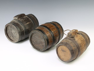 Three 18th/19th Century coopered barrels 20cm h x 12cm, 20cm x 10cm and 19cm x 14cm diam. 