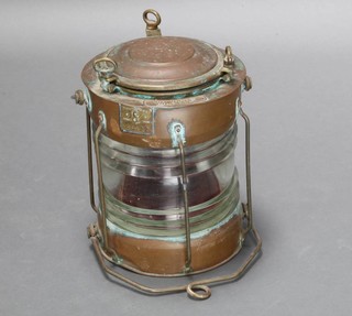 A Seahorse cylindrical copper port lamp marked Seahorse GB45122 34cm w x 27cm diam. 
