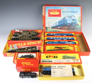 A Hornby OO RS52 blue Pullman train set boxed and with rails, a collection of red Triang,  a Triang R388 EM2 electric locomotive boxed, a Triang R525 060 tank engine boxed, a Hornby R333 GWR loco no.101 boxed, a Triang R.128 operating helicopter car boxed, a Triang Catapult plane R.562K, do. anti aircraft search light wagon R.341K and R249 exploding ammunition wagon