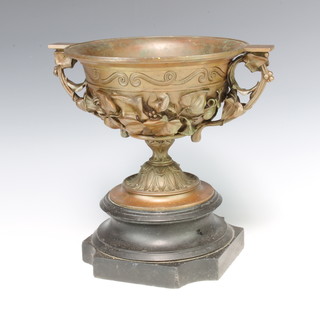 A Victorian bronze twin handled urn with ivory decoration, raised on a shaped marble foot 30cm h x 24cm w 