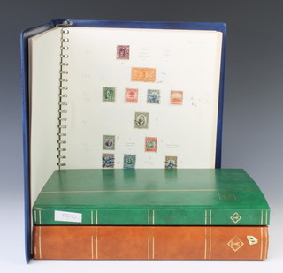 An album of mint and used Cuban stamps 1892-1969, a stock book of Cuban stamps and a stock book of French stamps 
