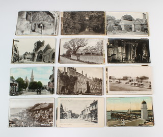 A black and white postcard of the High Street Henfield, 2 coloured postcards Kings Head Albourne and Stone and Pound crossroads Hassocks together with approx. 83 postcards of Sussex scenes including Littlehampton, Hastings etc  
