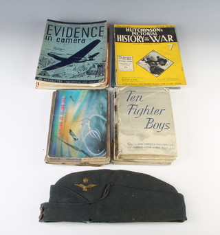 An RAF Officers forage cap by Burberry (some moth) together with various editions of Hutchinson's pictorial History of the War  and other pamphlets relating to the Second World War 