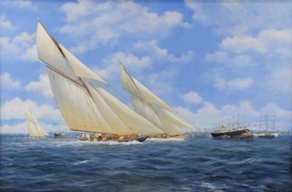 **John J Holmes, oil on canvas, signed, "Britannia racing to Lulworth on a busy day in the Solent" 60cm x 90cm 