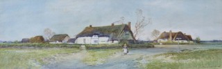 S Sinclair, watercolour signed, figure on a country lane with thatched buildings 17cm x 53cm 