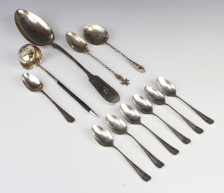 A Victorian silver and whale bone handled sauce ladle Birmingham 1855 and minor cutlery 