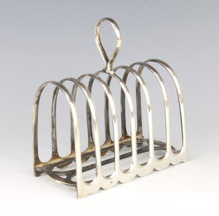 A silver 5 bar arched toast rack Sheffield 1935 297 grams