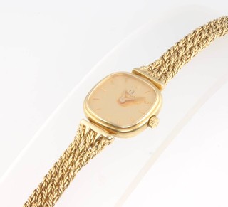 A lady's 9ct yellow gold Omega wristwatch on a do. bracelet, gross weight 17.6 grams 