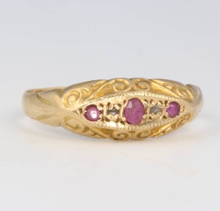 An 18ct yellow gold ruby and diamond ring size O 