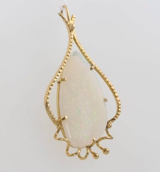 A 9ct yellow gold opal pendant 50mm x 28mm 
