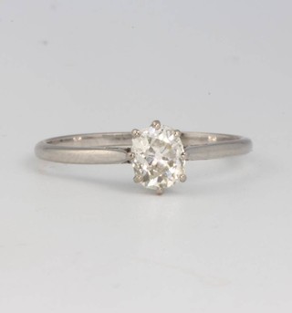 A platinum single stone mine cut diamond ring, size O, approx 0.6ct  