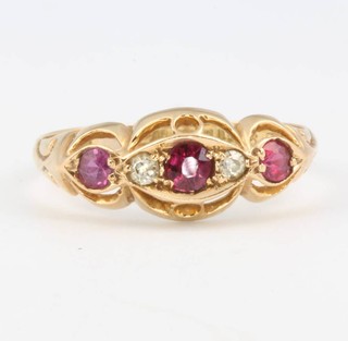 An 18ct yellow gold ruby and diamond ring size Q 