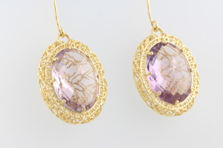 A pair of 9ct yellow gold pale amethyst earrings  