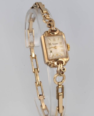A lady's 9ct yellow gold Rotary wristwatch on a plated bracelet