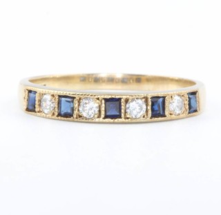 A 9ct yellow gold sapphire and diamond ring set with 4 brilliant cut diamonds and 5 princess cut sapphires, size U 