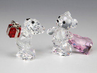 A Swarovski Crystal Kris Bear with You, heart behind him 905386/9400000149 2008 by Elizabeth Adamer 4cm and Kris Bear A Gift for You 905788/9400000162 2008 by Peter Heidegger 4cm boxed 