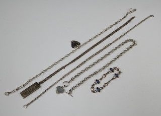 A silver ingot and chain and minor silver jewellery 159 grams 