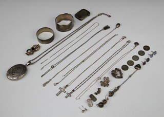 A silver locket and chain and minor silver jewellery