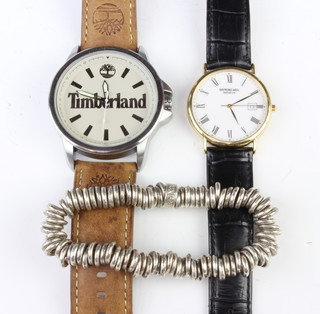 A gentleman's gilt cased Raymond Weil calendar wristwatch, a Timberland watch and a Links silver bracelet 